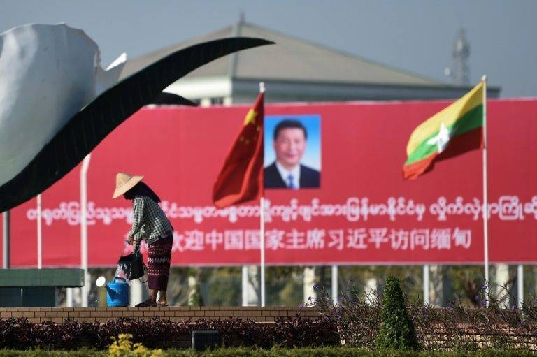 Billboards and banners welcomed China's Xi Jinping to Naypyidaw on Friday. — AFP