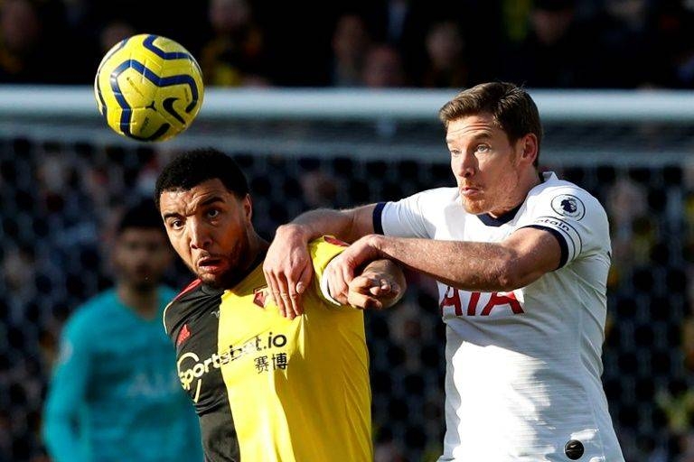 Watford's Troy Deeney (L) vies with Spurs defender Jan Vertonghen. — AFP 