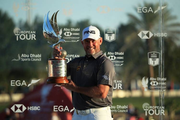 Lee Westwood of England poses with the trophy after winning the Abu Dhabi HSBC Championship following his final round on Day Four of the Abu Dhabi HSBC Championship at Abu Dhabi Golf Club on Sunday in Abu Dhabi. — AFP
