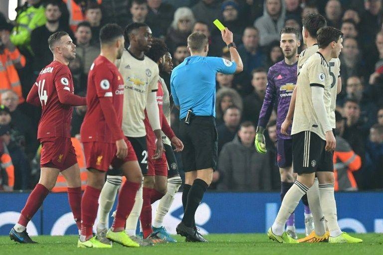 Manchester United have been charged over the conduct of their players in the 2-0 defeat by Liverpool which saw Spanish goalkeeper David de Gea booked. — AFP