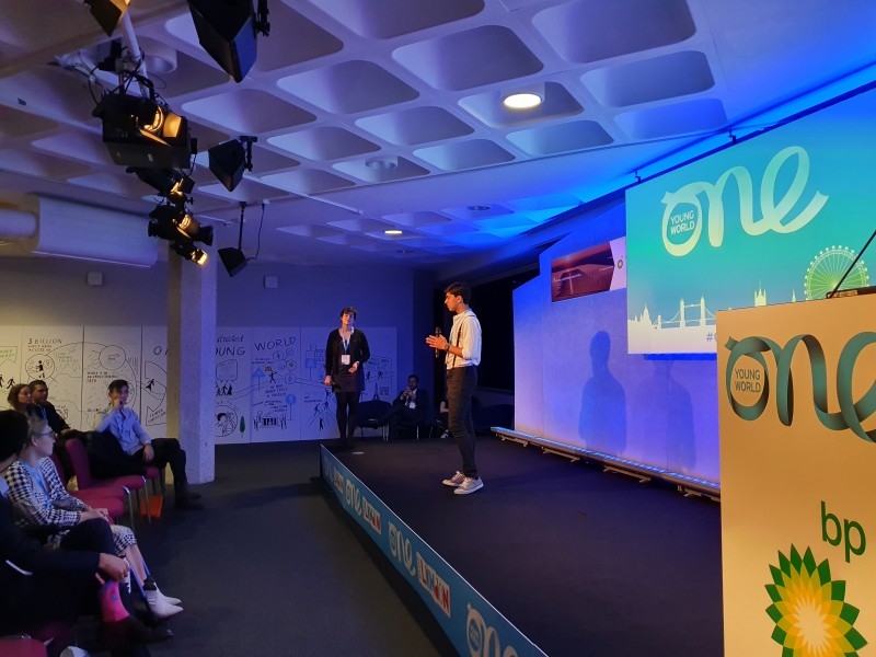 Zubair Junjunia on the Advancing Energy Stage for the Lightning Pitches at the One Young World Summit 2019, London.