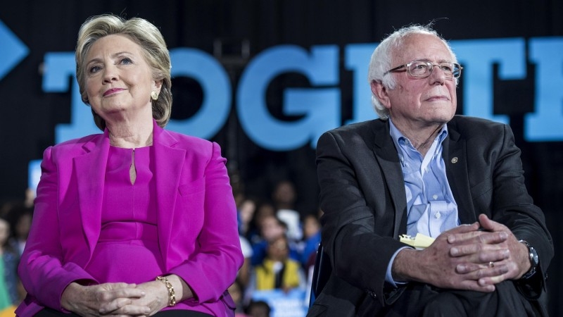 Former US Secretary of State Hillary Clinton, left, and her 2016 Democratic rival Bernie Sanders are seen in this combo file picture. — Courtesy photo