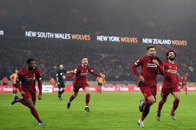 Roberto Firmino (2nd right) struck a late winner for Liverpool at Wolves in the English Premier League.