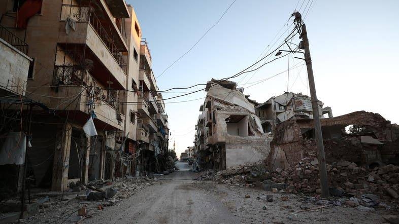 Damaged buildings that were hit during recent airstrikes by pro-regime forces in the jihadist-held city of Maaret Al-Numan in Syria's northwestern Idlib province. — AFP