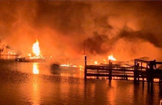 The fire broke out around midnight on Sunday into Monday, tearing through a dock area on the lake and destroying 35 boats. — Courtesy photo