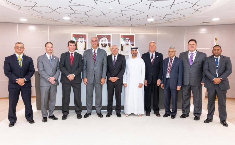 
Eng. Mohamed Al Hammadi (fifth from right) ENEC CEO; and Mark Reddemann (fourth from the right), CEO of Nawah, with the WANO team.

