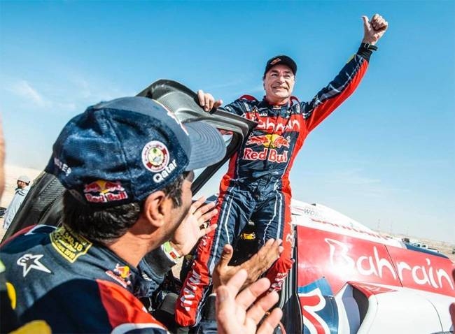 File photo shows Carlos Sainz waves to fans after winning the Dakar Rally for the third time in Qiddiya, Saudi Arabia. — Courtesy photo