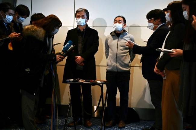 Japanese nationals airlifted from the epicenter of China's deadly viral epidemic speak to reporters in Tokyo. — AFP