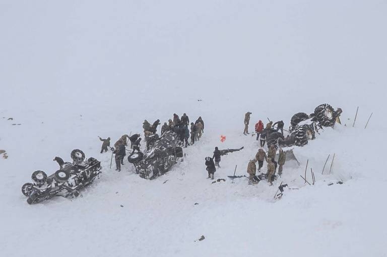 The bodies of more than two dozen rescue workers and civilians were discovered in Van province, where they had been helping dig out a minibus buried by a first avalanche late Tuesday. — AFP