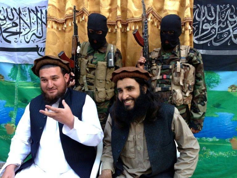 Tehreek-e-Taliban Pakistan (TTP) spokesman Ehsanullah Ehsan, left, and his TTP member Adnan Rasheed are seen in Shabtoi, South Waziristan, Pakistan, in this 2013 file photo. — AFP