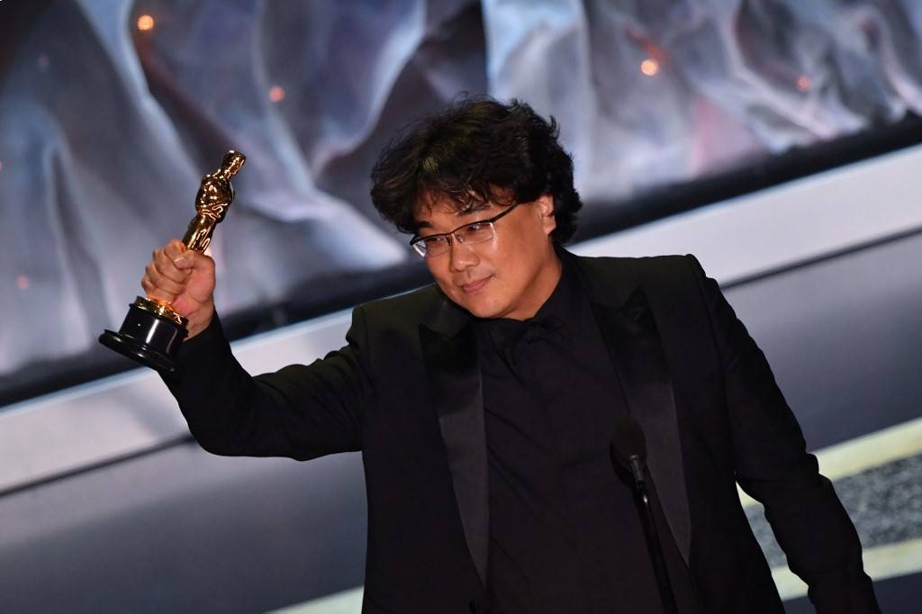 South Korean director Bong Joon-ho accepts the award for Best International Feature Film for 