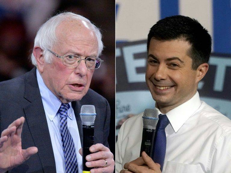 Bernie Sanders, left, and Pete Buttigieg came top of the first contest in Iowa, giving each important momentum. — AFP