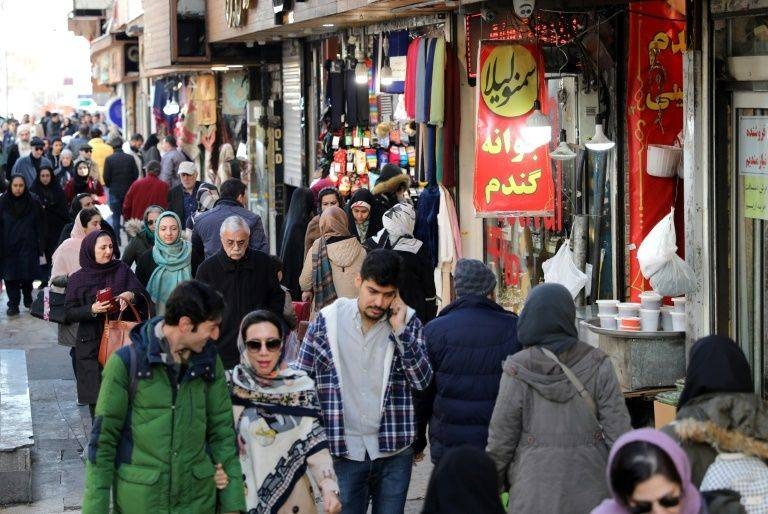 People walk through a thoroughfare off north Tehran's Tajrish Square. — Courtesy photo
