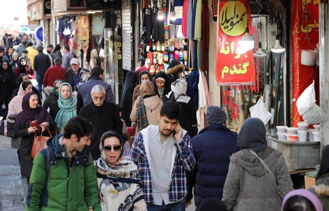 On a crisp winter's day the snow glistens on the mountains above Tehran, but the mood is as heavy as the pall of pollution that often shrouds Iran's capital.— AFP