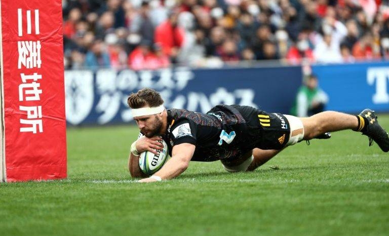 Lachlan Boshier scores a try for the Chiefs during their Super Rugby match against the Sunwolves. — AFP 