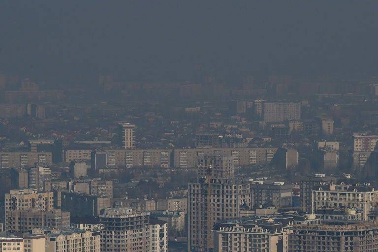 A heavy cloud of dark smog often blots out the view of snow-capped mountains in the Kyrgyz capital of Bishkek. — AFD