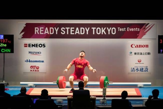 China's Yang Zhe in action during a weightlifting test event for Tokyo 2020. — AFP