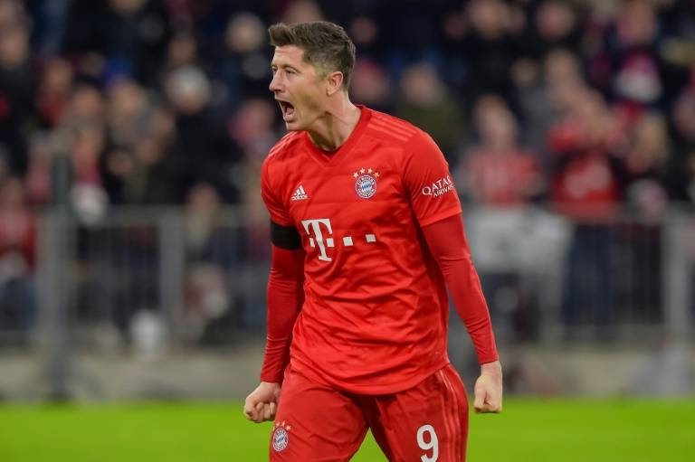 Polish forward Robert Lewandowski netted twice in Bayern Munich's 3-2 league win over bottom side Paderborn. — AFP