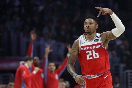 Sacramento Kings Kent Bazemore gestures after making a three-point basket during the second quarter in a game against the LA Clippers at Staples Center. — AFP