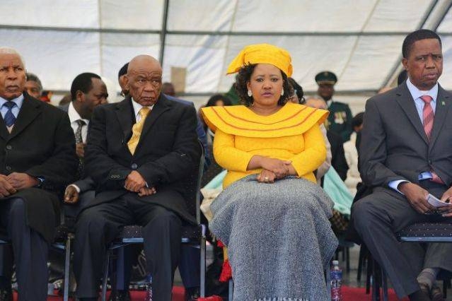 Lesotho Prime Minister Thomas Thabane, second left, and his future wife, Maesaiah Thabane, second right, attend his inauguration, two days after his wife's murder in this 2017 file photo. — AFP