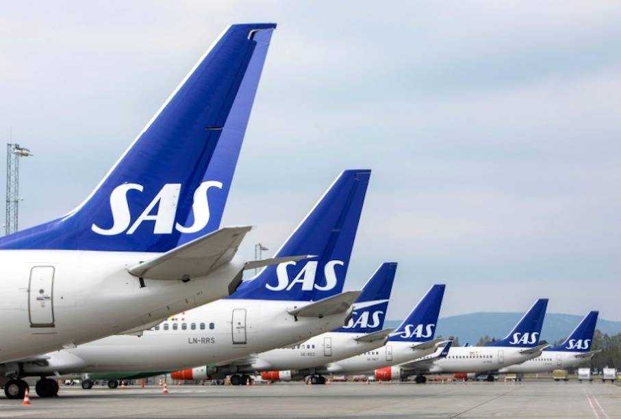 Scandinavian airline SAS said Wednesday its net loss widened in the first quarter and forecast that the economic impact from the novel coronavirus would be limited, while noting the outlook was 