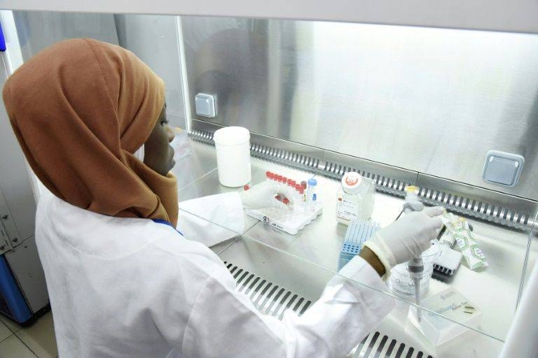 Hunting the virus: A worker in a secure lab at the Pasteur Institute in Dakar. — AFP 