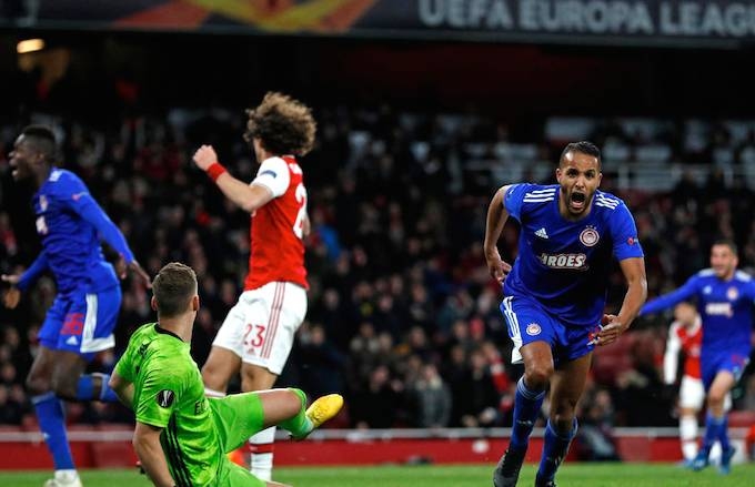 Youssef El-Arabi scored in the last minute of extra-time as Olympiakos knocked Arsenal out of the Europa League on Thursday on a night when four former European champions were eliminated. — AFP