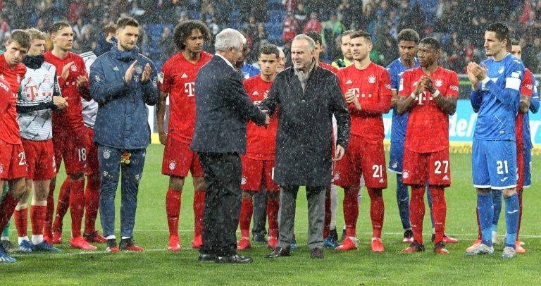 Hoffenheim owner Dietmar Hopp shakes hand with Bayern chief executive Karl-Heinz Rummenigge. — AFP 