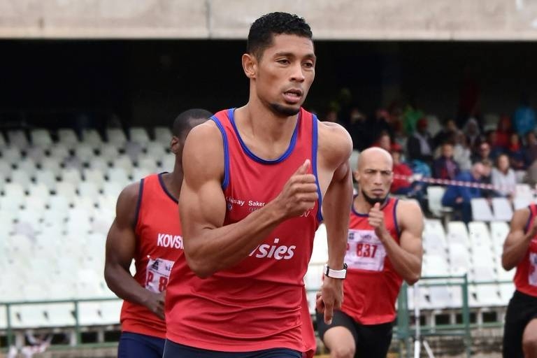 Wayde van Niekerk heads for victory in the 400m race at the Free State provincial championships in Bloemfontein. — AFP