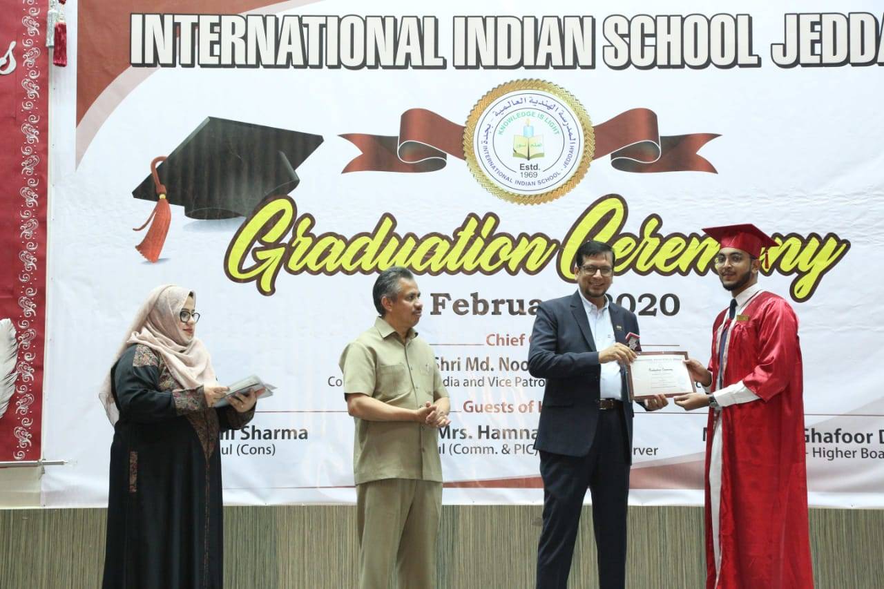 Indian Consul General Mohammed Noor Rahman Sheikh presenting certificate to a graduate as Principal Dr. Muzaffar Hassan looks on. — SG photos