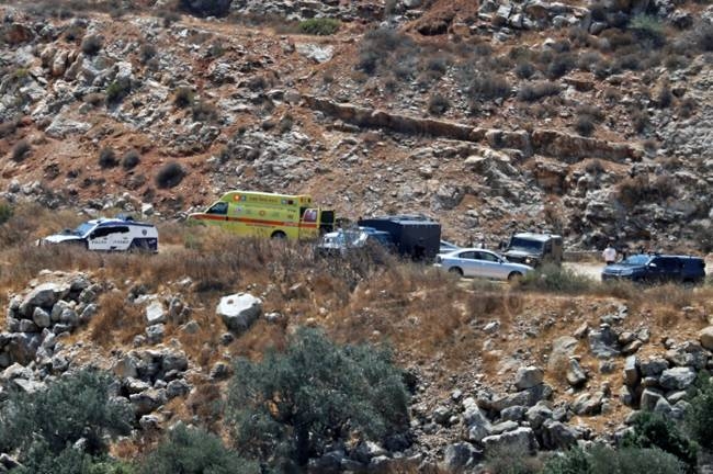 Israeli ambulance crews and security forces deploy to the scene of a bomb attack near the Israeli settlement of Dolev in the occupied West Bank on Aug. 23, 2019. — AFP

