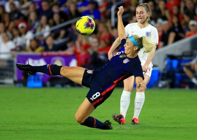 USA midfielder Julie Ertz blocks a pass during her team's 2-0 defeat of England in the SheBelieves Cup friendly tournament. — AFP