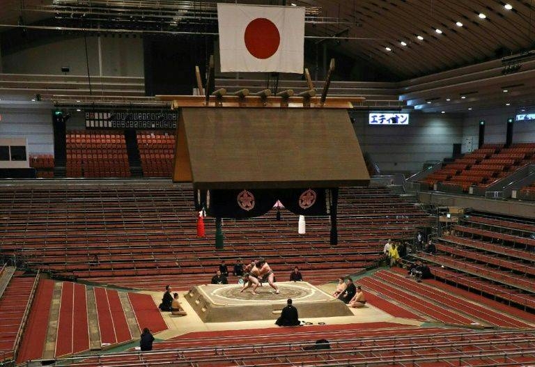 The Grand Sumo Tournament in Edion Arena, Osaka, is taking place without spectators due to the coronavirus outbreak. — AFP