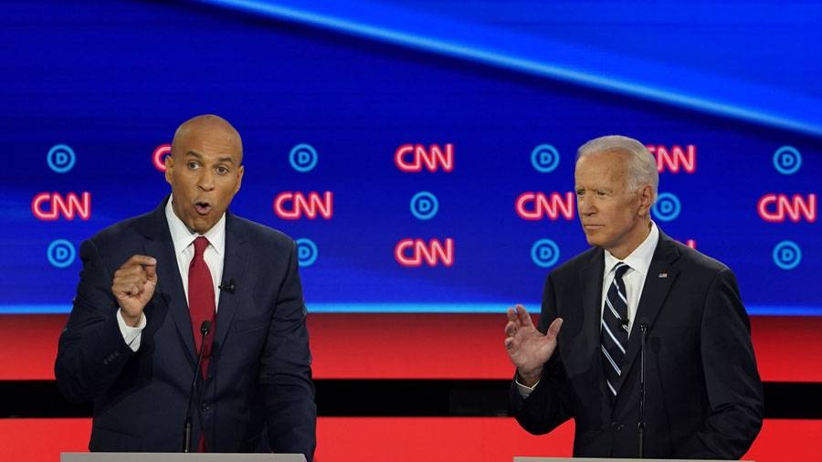 US Senator Cory Booker, left, and former Vice President Joe Biden are seen during a debate on criminal justice and race in this file picture. — Courtesy photo