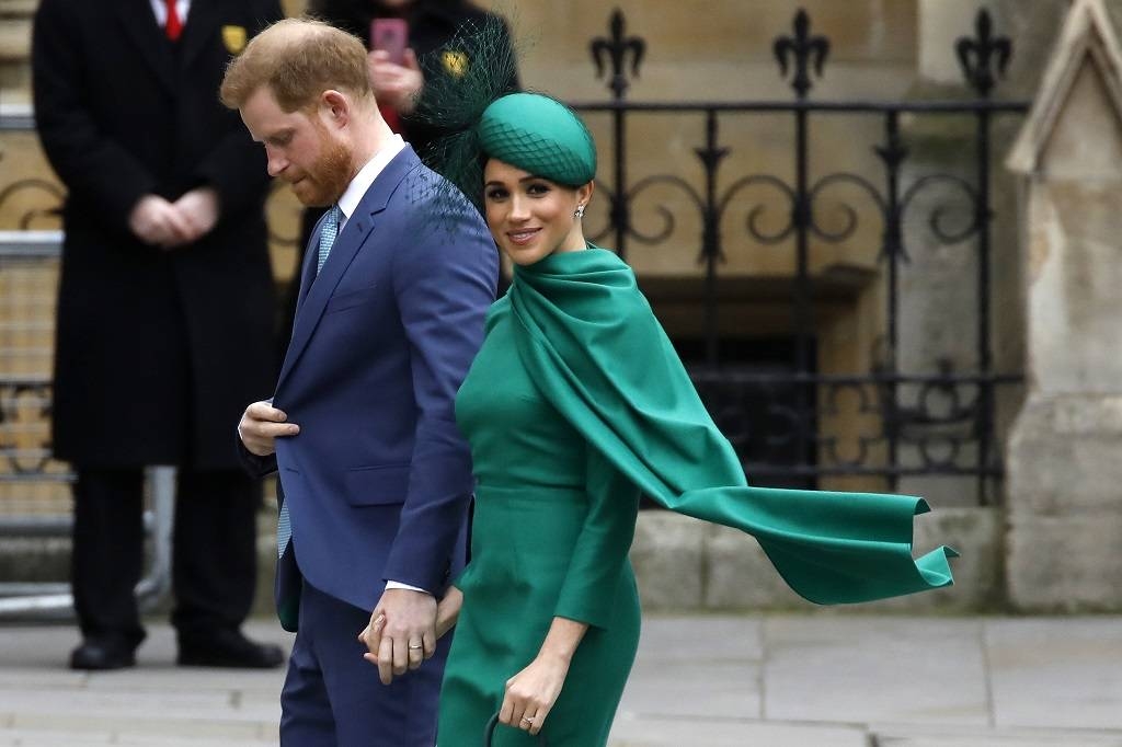 Britain's Prince Harry, Duke of Sussex, left, and Meghan, Duchess of Sussex arrive to attend the annual Commonwealth Service at Westminster Abbey in London on Monday. — AFP