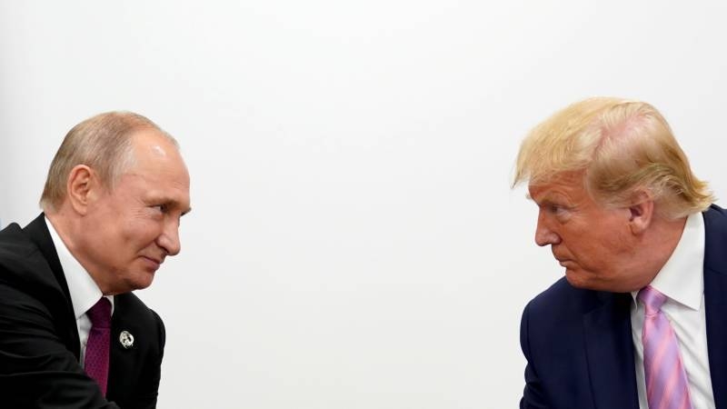 US President Donald, right, and his Russian counterpart Vladimir Putin are seen in this file picture. — Courtesy photo