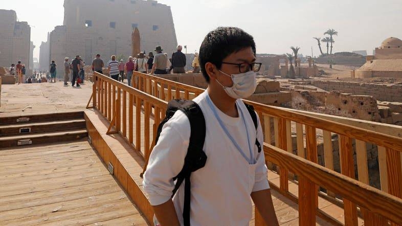 A tourist wears a protective mask during his visit to Luxor Temple in Egypt. ­‑ Courtesy photo
