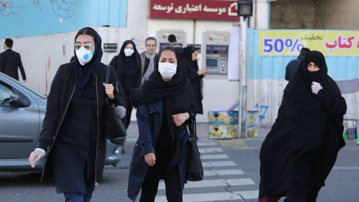 Pedestrians are seen in protective masks in Tehran’s streets in this file picture. — Courtesy photo
