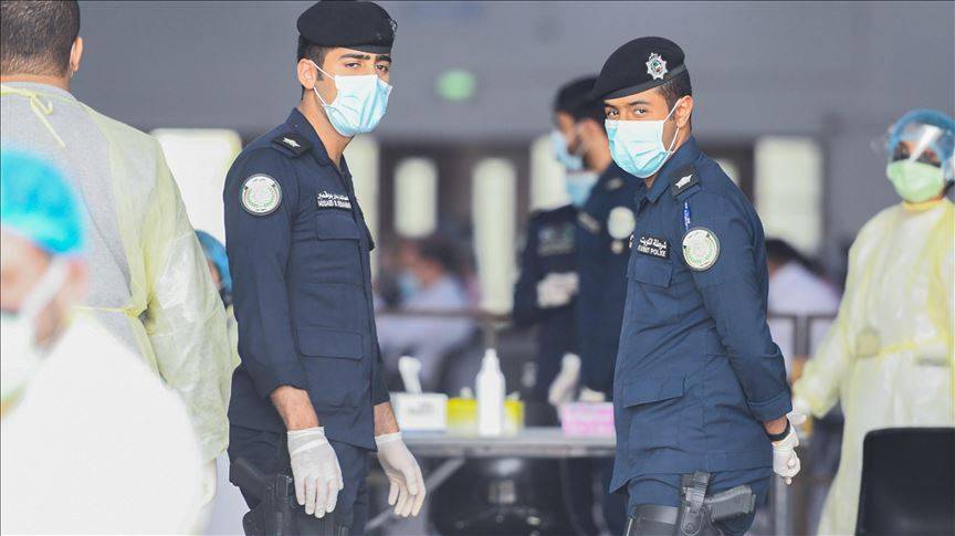 Security force members stand guard at the fairground which has become a health center in Kuwait City in this March 12, 2020 file picture. — Courtesy photo