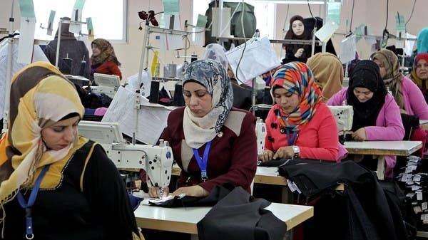 Jordanian women sew jeans for the US market in a garment factory in the village of Kitteh in northern Jordan. ‑‑ Courtesy photo
