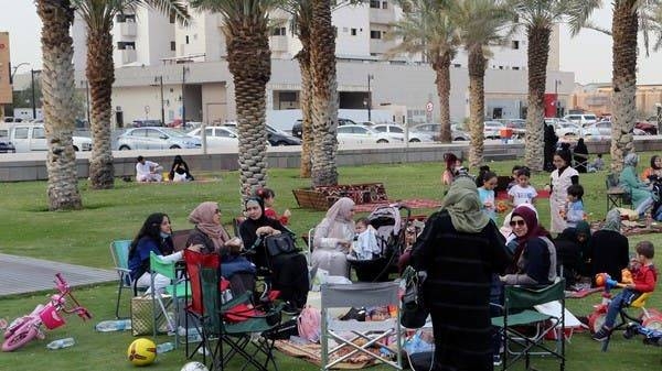 Visitors sit in the garden of the King Fahd Library in Riyadh, ignoring the government directive against social gatherings. — Courtesy photo