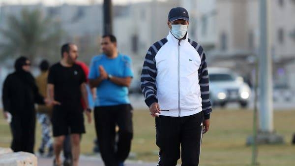 A man wears a protective face mask after Saudi Arabia imposed a temporary lockdown on the province of Qatif, following the spread of coronavirus -- File photo