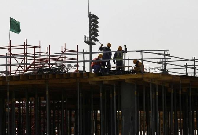 Migrant laborers work at a construction site in Doha in March 26, 2020 file picture. — Reuters 
