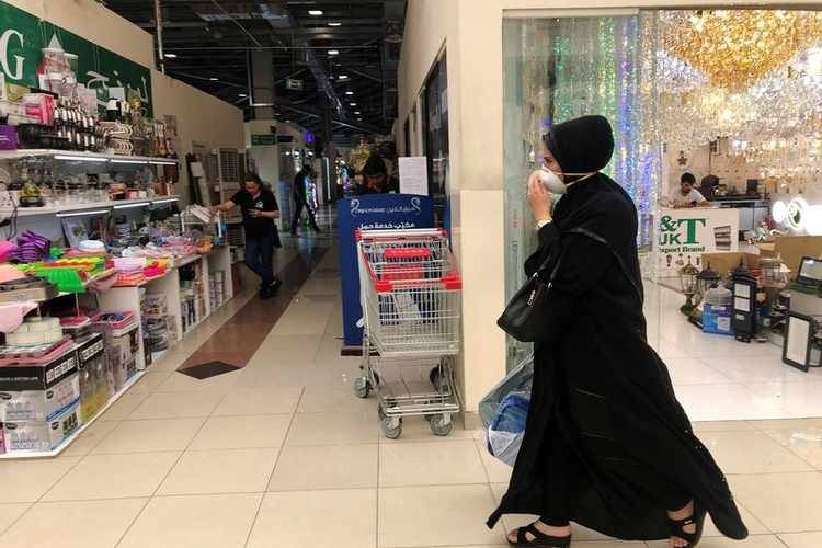 A woman wears a protective face mask, following the outbreak of the new coronavirus, as she walks at Dragon Mart, a Chinese themed discount shopping centre, in Dubai, in this file picture. — Courtesy photo