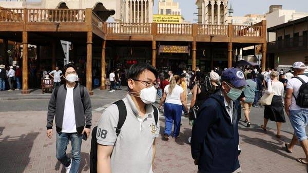 
Caption: Tourists wear protective face masks as they walk at the Grand Souq in old Dubai in this file picture. — Courtesy photo
