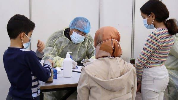 Expatriates returning from Egypt, Syria, and Lebanon arrive to be re-tested at a Kuwaiti health ministry containment and screening zone for COVID-19 coronavirus disease in Kuwait City. -- File photo