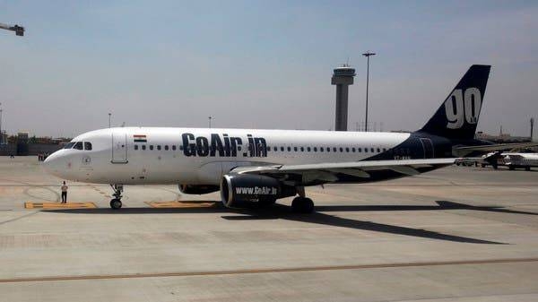 A GoAir aircraft taxis on the tarmac at India's Bengaluru International Airport. -- File photo
