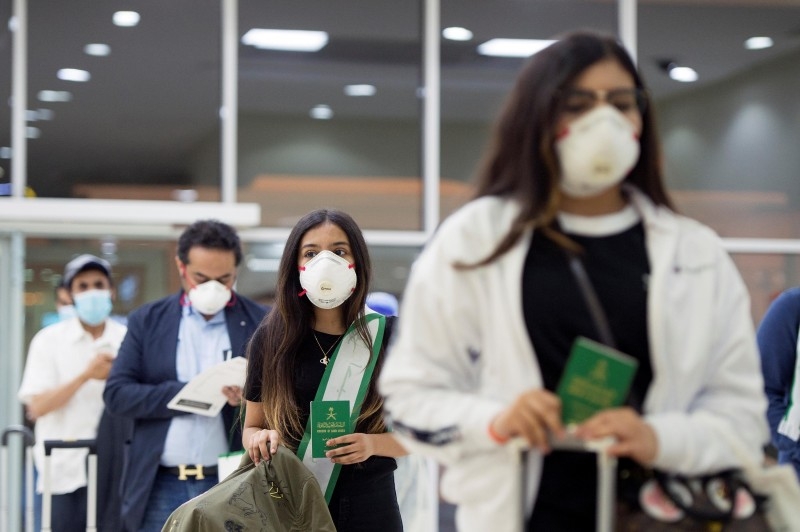 The Saudi Arabian Airlines flight with repatriated citizens from the Austrian capital, Vienna, arrives at the Prince Naif Bin Abdulaziz International Airport in Qassim on Friday.