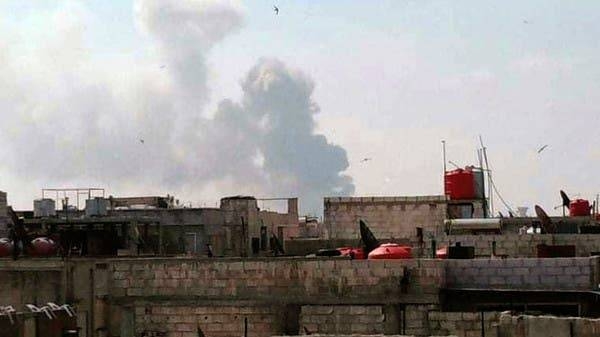 A handout picture released by the official Syrian Arab News Agency (SANA) on May 1, 2020, shows smoke billowing above buildings in Syria's central city of Homs. -- Courtesy pictures

