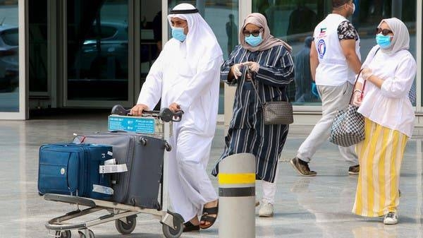 A Kuwaiti national, residing abroad, comes out of the Kuwait International airport. — Courtesy photo